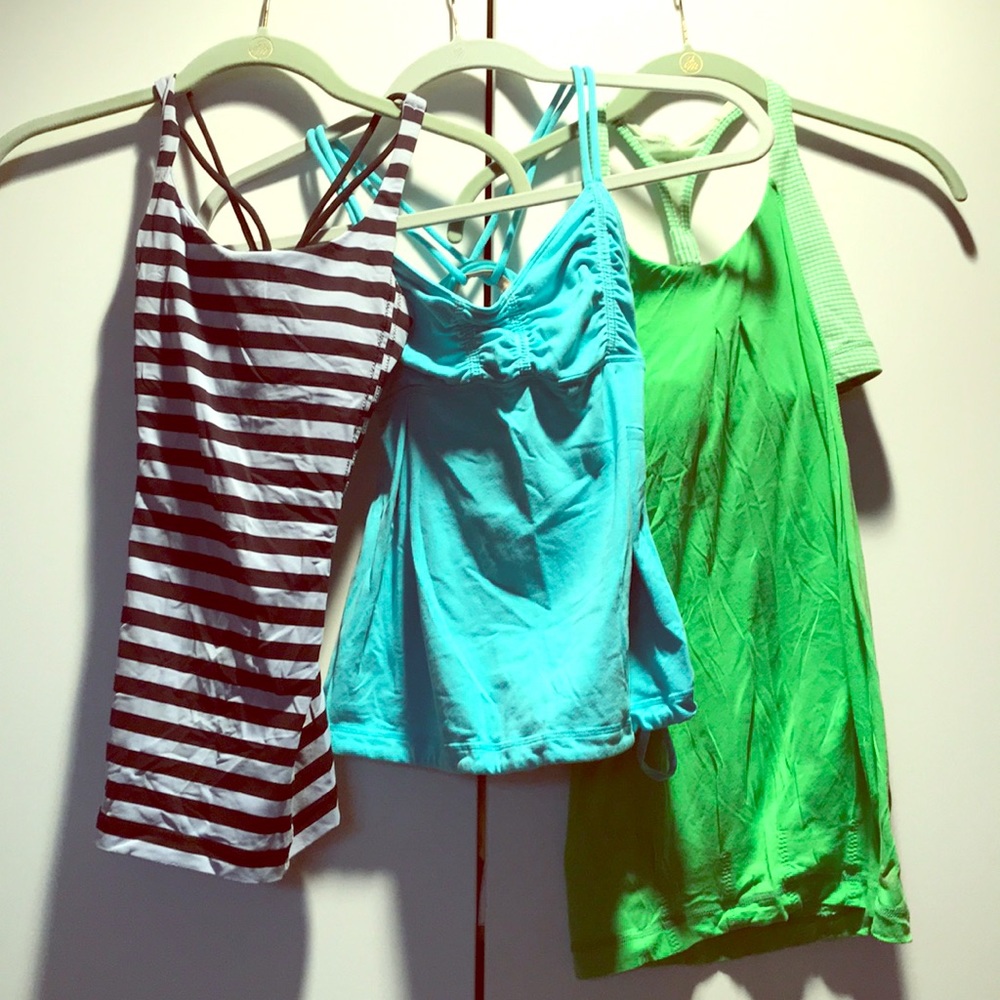 3 Lululemon workout tanks. Sz 2. All 3 for $25.